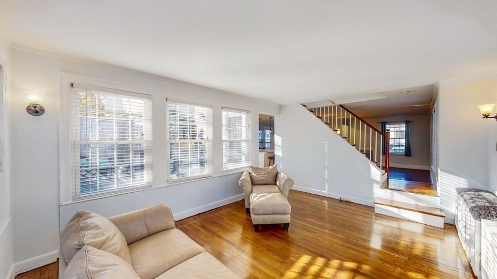 8 Samoset Road Dedham, MA 02026 - Photo 9 of 35 a living room with furniture and large windows