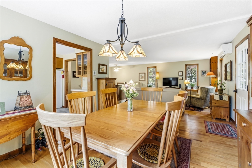 788 Burts Pit Road Northampton, MA 01062 - Photo 17 of 42 a view of a dining room with furniture window and wooden floor