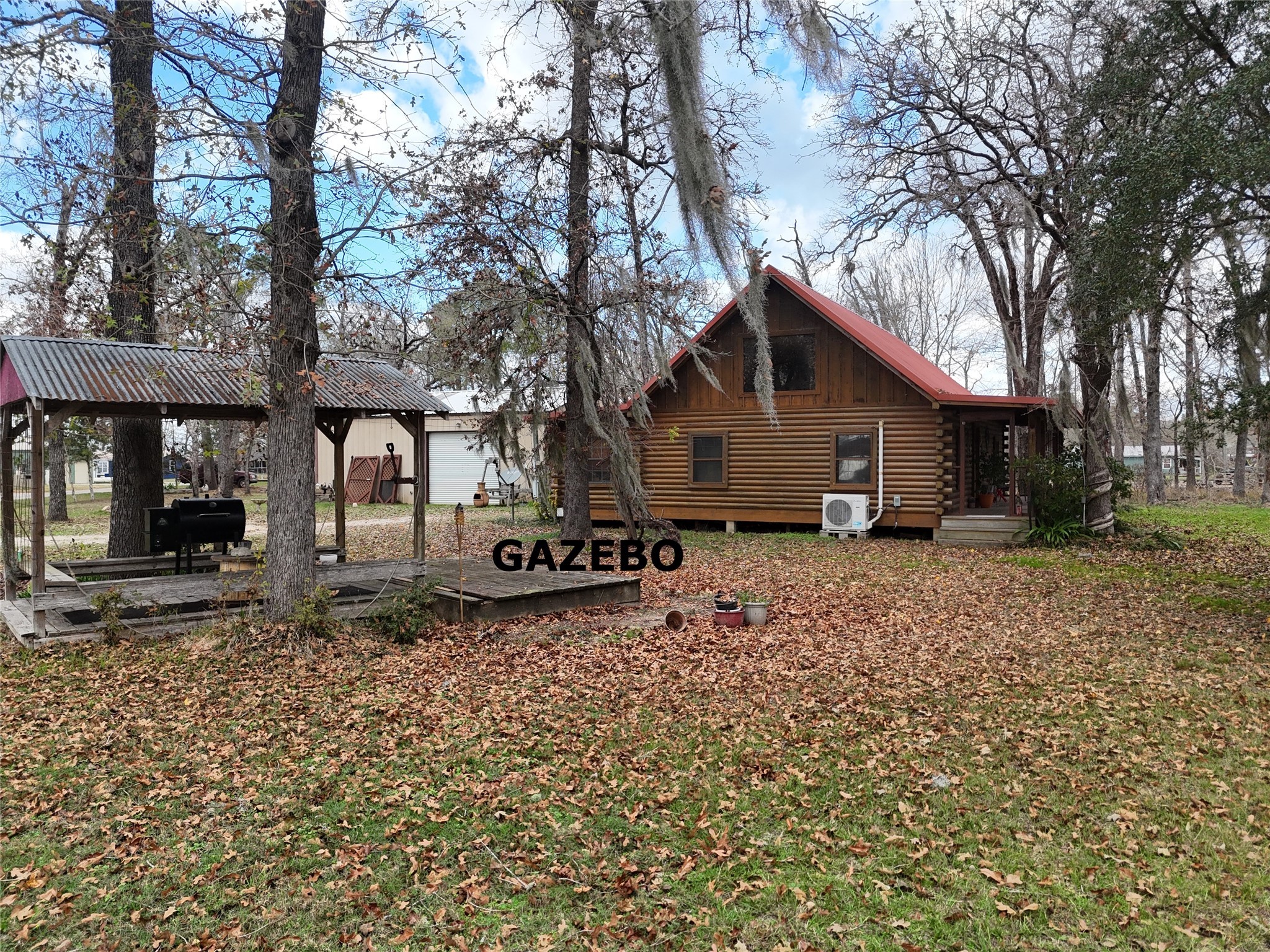 290 Armadillo Road Trinity, TX 75862 - Photo 12 of 28 a front view of a house with a yard