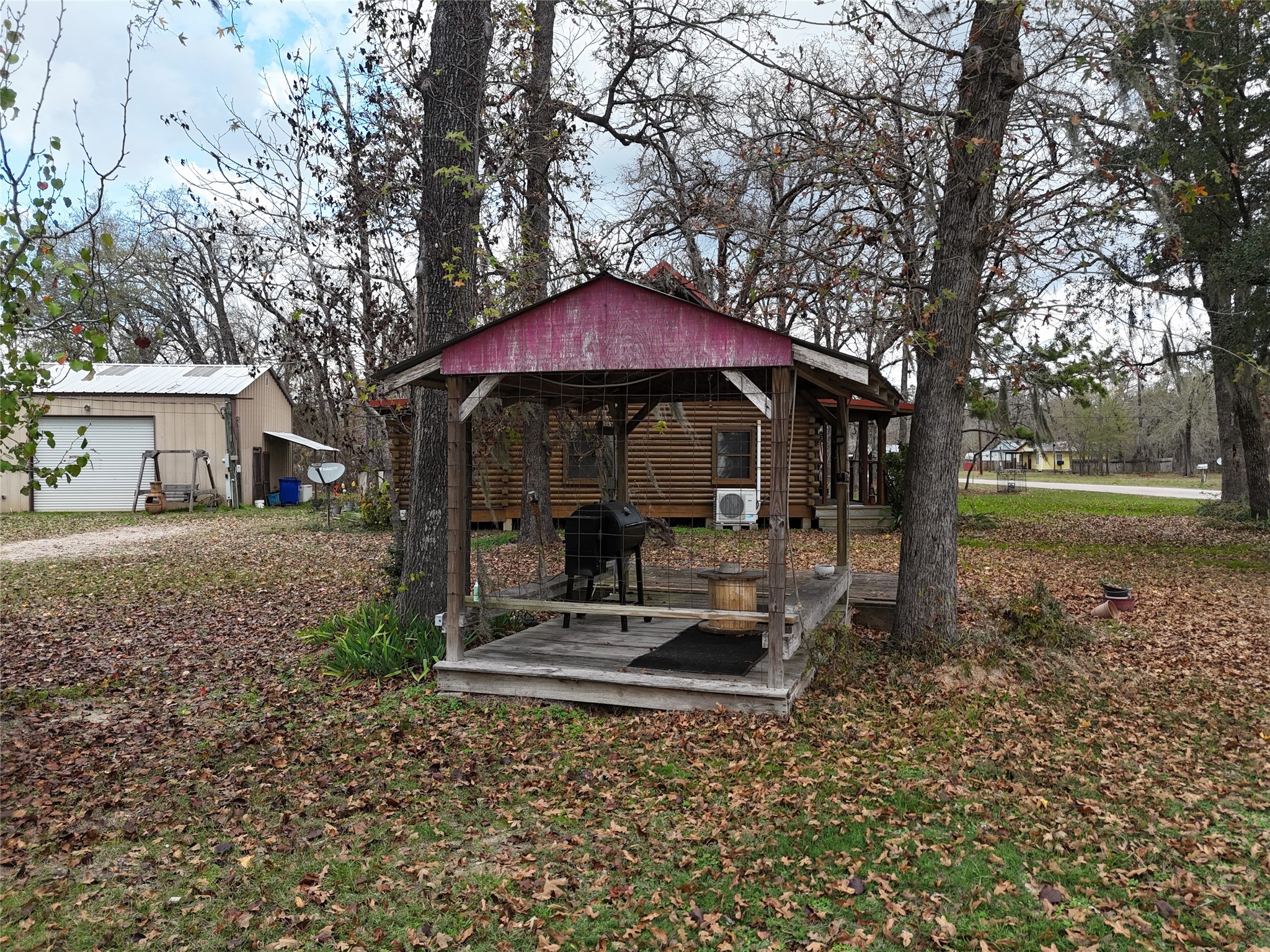 290 Armadillo Road Trinity, TX 75862 - Photo 14 of 28 a front view of a house with garden