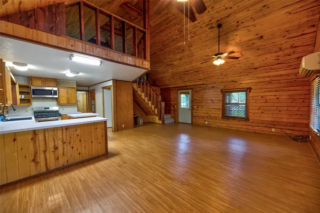 a view of an empty room with a window