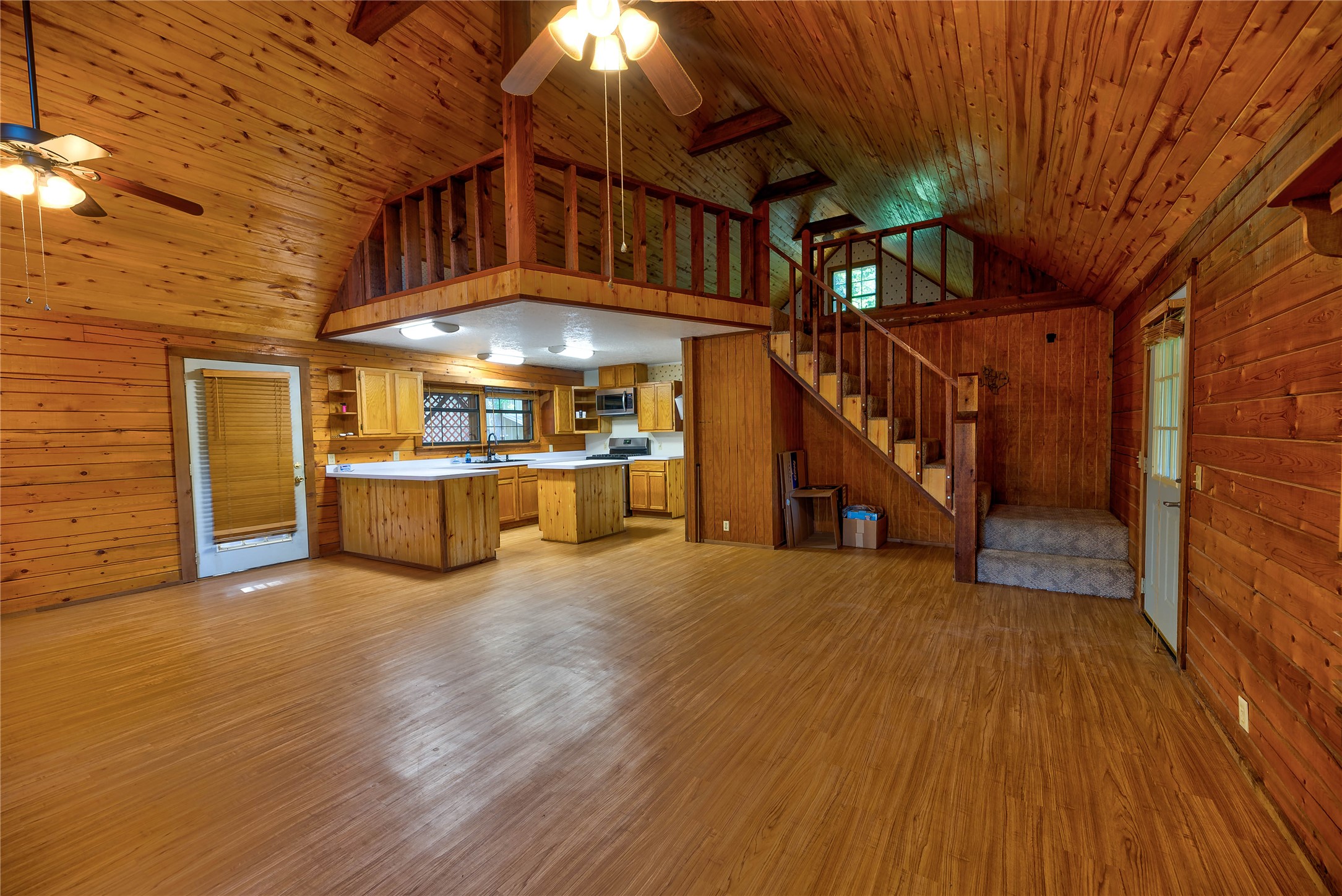 290 Armadillo Road Trinity, TX 75862 - Photo 19 of 28 a view of a hall with wooden floor
