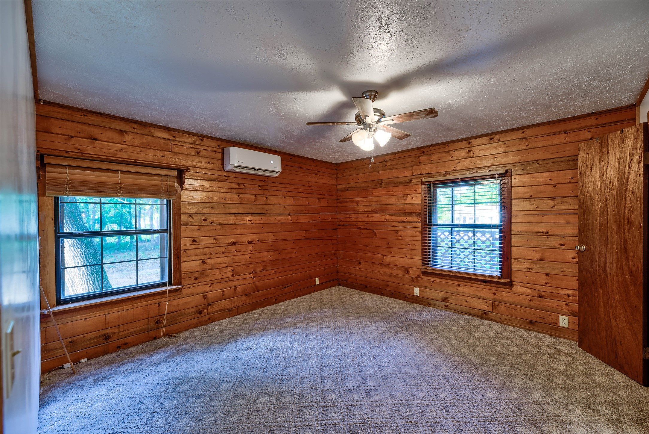 290 Armadillo Road Trinity, TX 75862 - Photo 20 of 28 a view of an empty room with a window