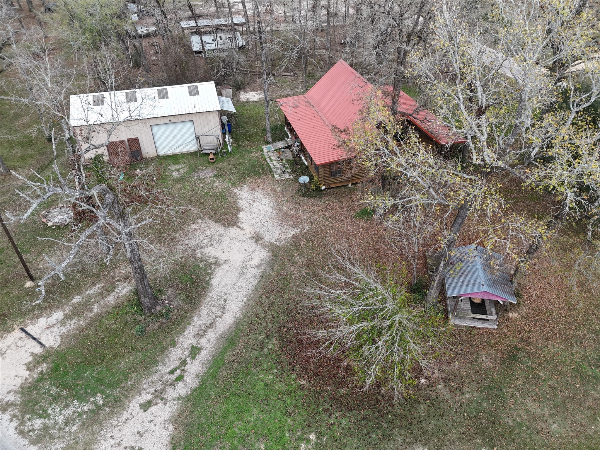 290 Armadillo Road Trinity, TX 75862 - Photo 5 of 28 an aerial view of a house with outdoor space