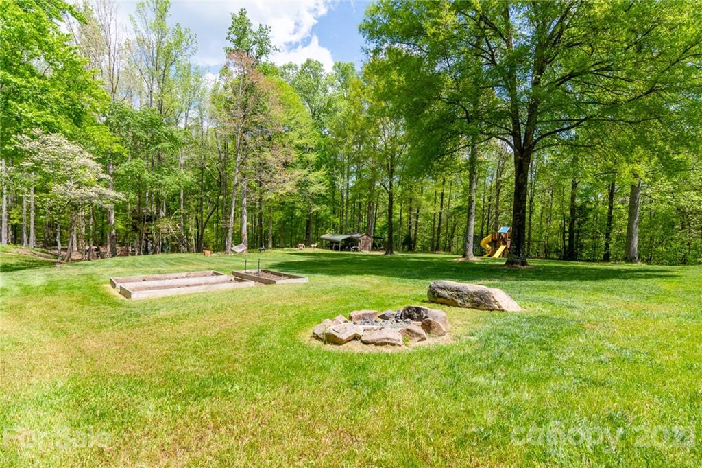 5103 King Wilkinson Road Denver, NC 28037 - Photo 14 of 48 a view of a park with large trees