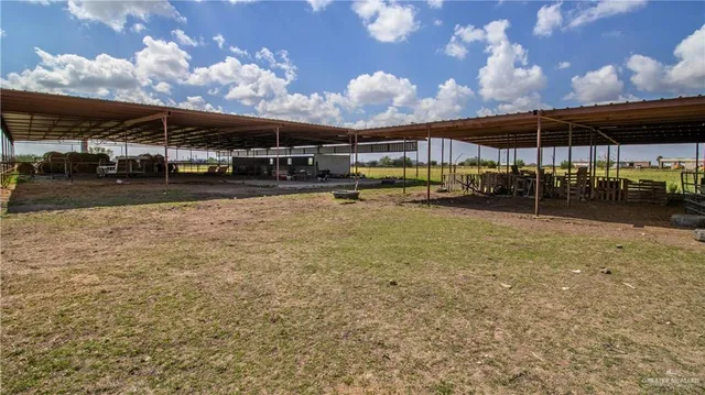 a view of a yard with an outdoor space