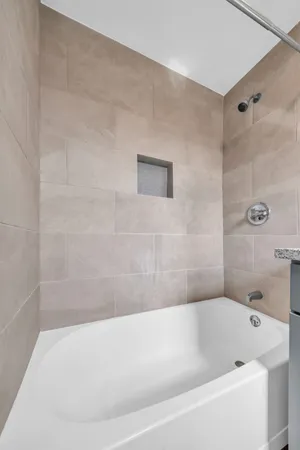 a bathroom with a bathtub