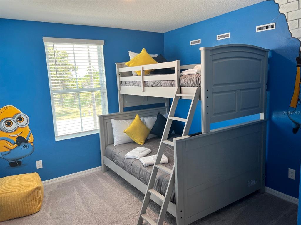 955 Conch Road Davenport, FL 33896 - Photo 11 of 20 a living room with furniture and a window