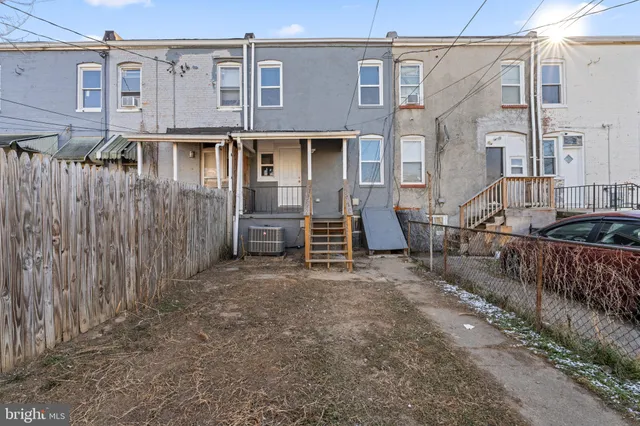 a view of a house with a street