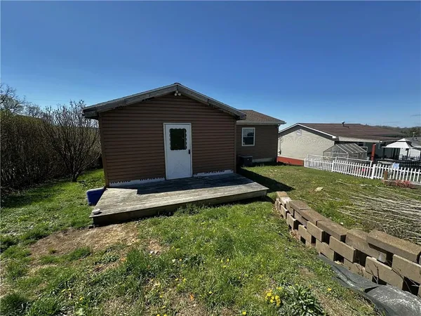 a view of a backyard with a garden