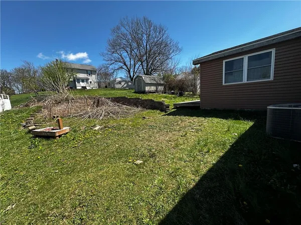 a view of a backyard with plants