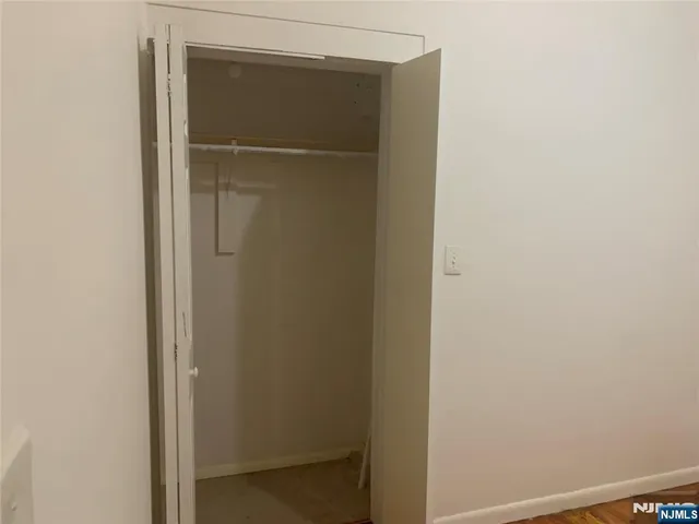 a view of small space with wooden floor