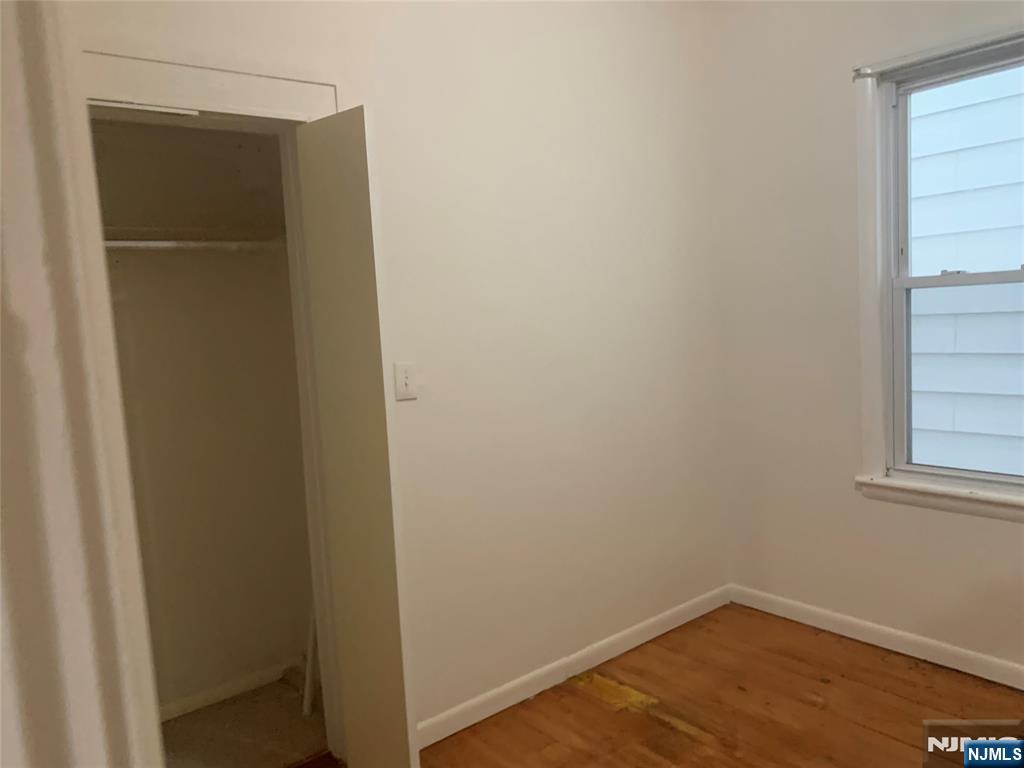 10 Exchange Place, Unit 1 Clifton, NJ 07011 - Photo 14 of 19 a view of small space with wooden floor