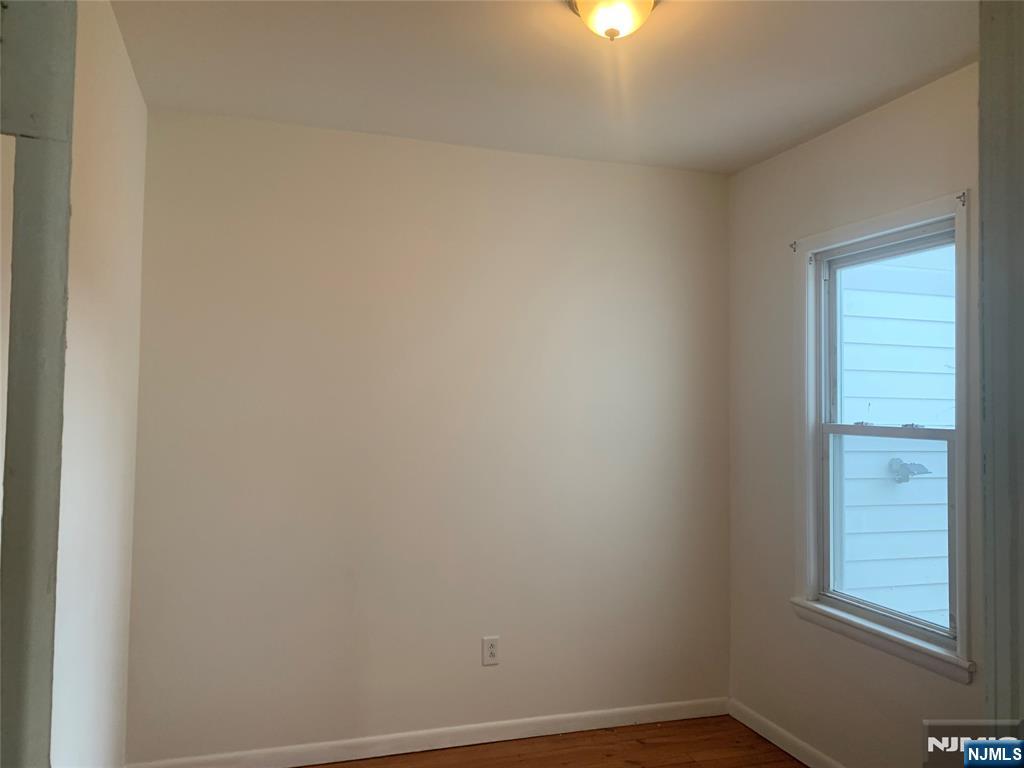 10 Exchange Place, Unit 1 Clifton, NJ 07011 - Photo 10 of 19 a small space with a window