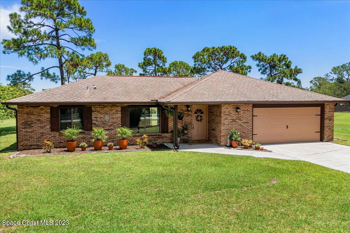 2100 Atz Road Malabar, FL 32950 - Photo 1 of 49 3/2/2 porch