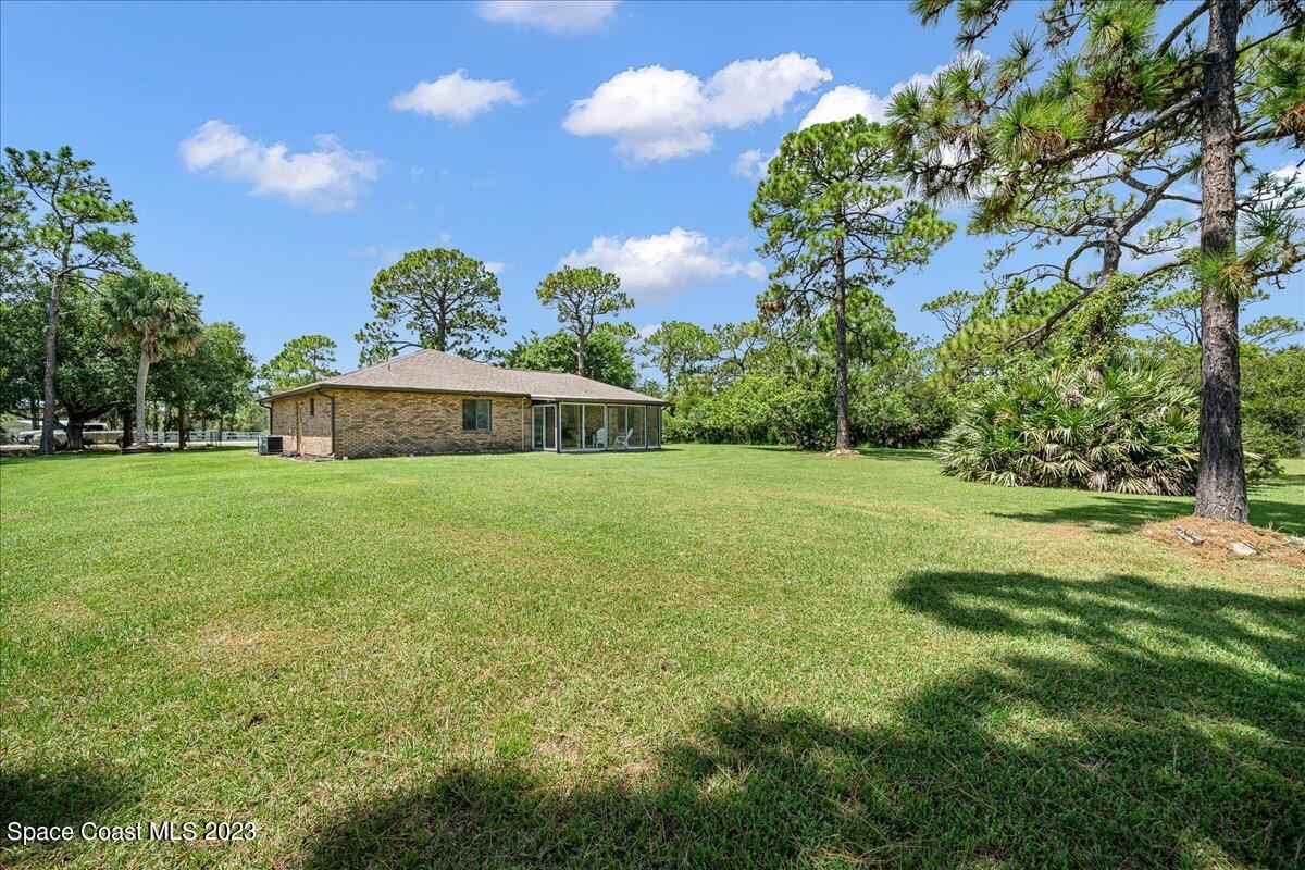 2100 Atz Road Malabar, FL 32950 - Photo 34 of 49 View from rear yard to back of home