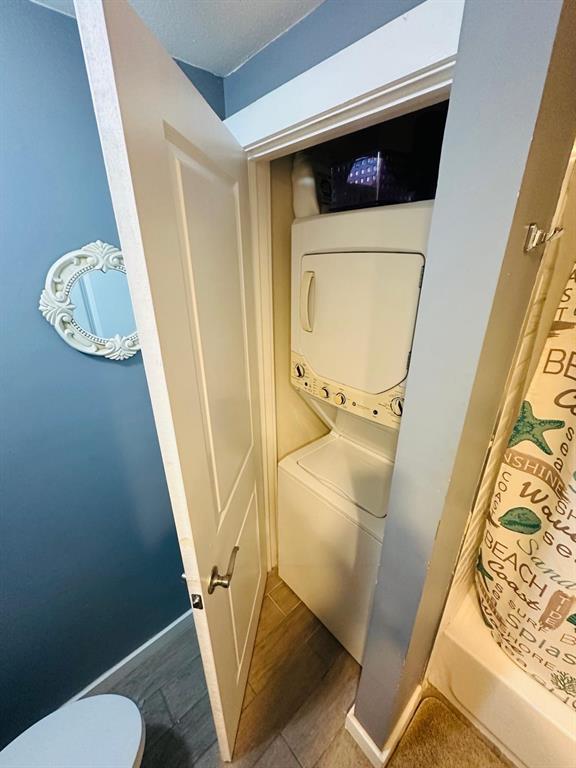 7340 Skillman Street, Unit 1203 Dallas, TX 75231 - Photo 7 of 12 a utility room with dryer and washer