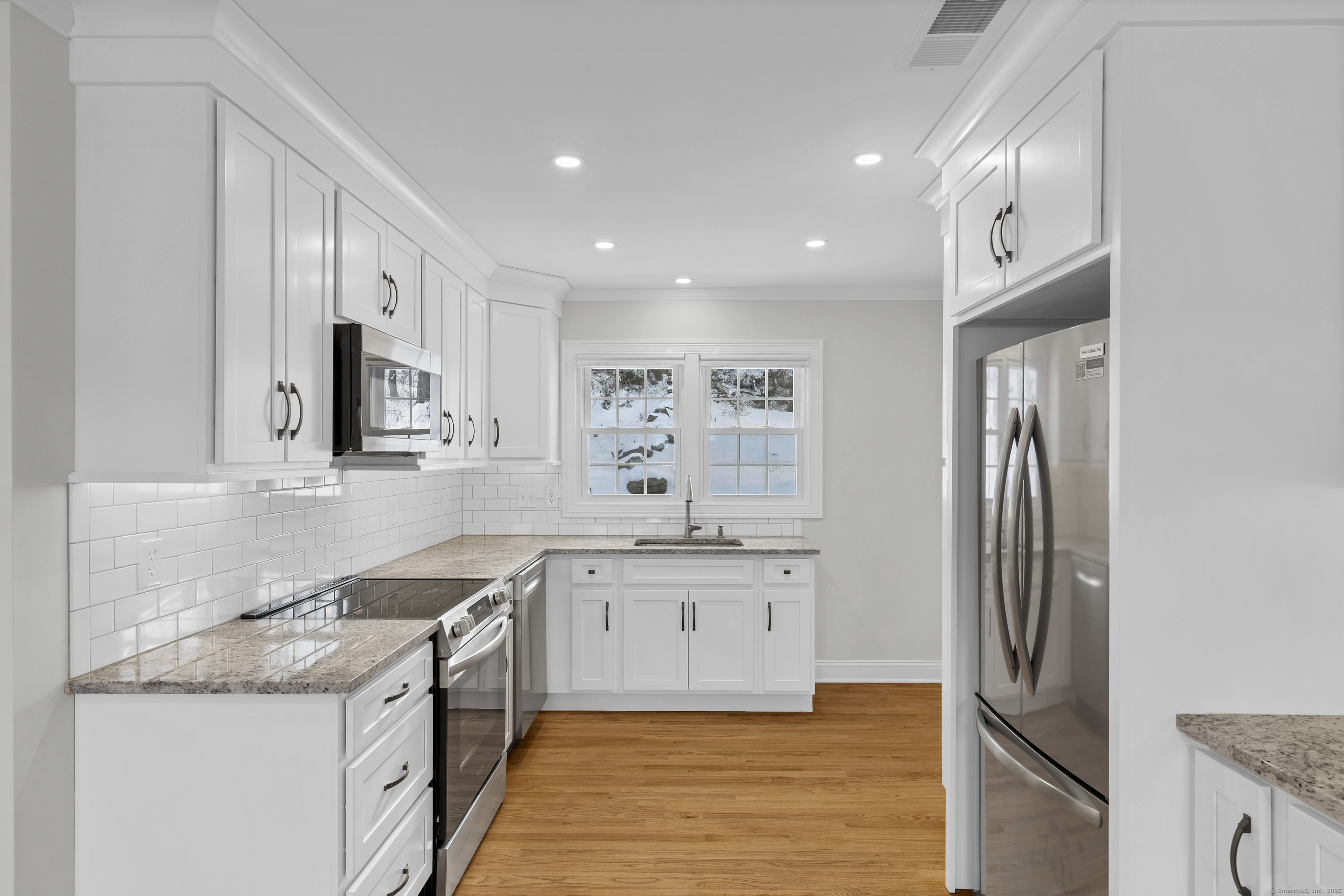 122 North Street, Unit 4 Guilford, CT 06437 - Photo 1 of 22 a kitchen with a sink stove and refrigerator