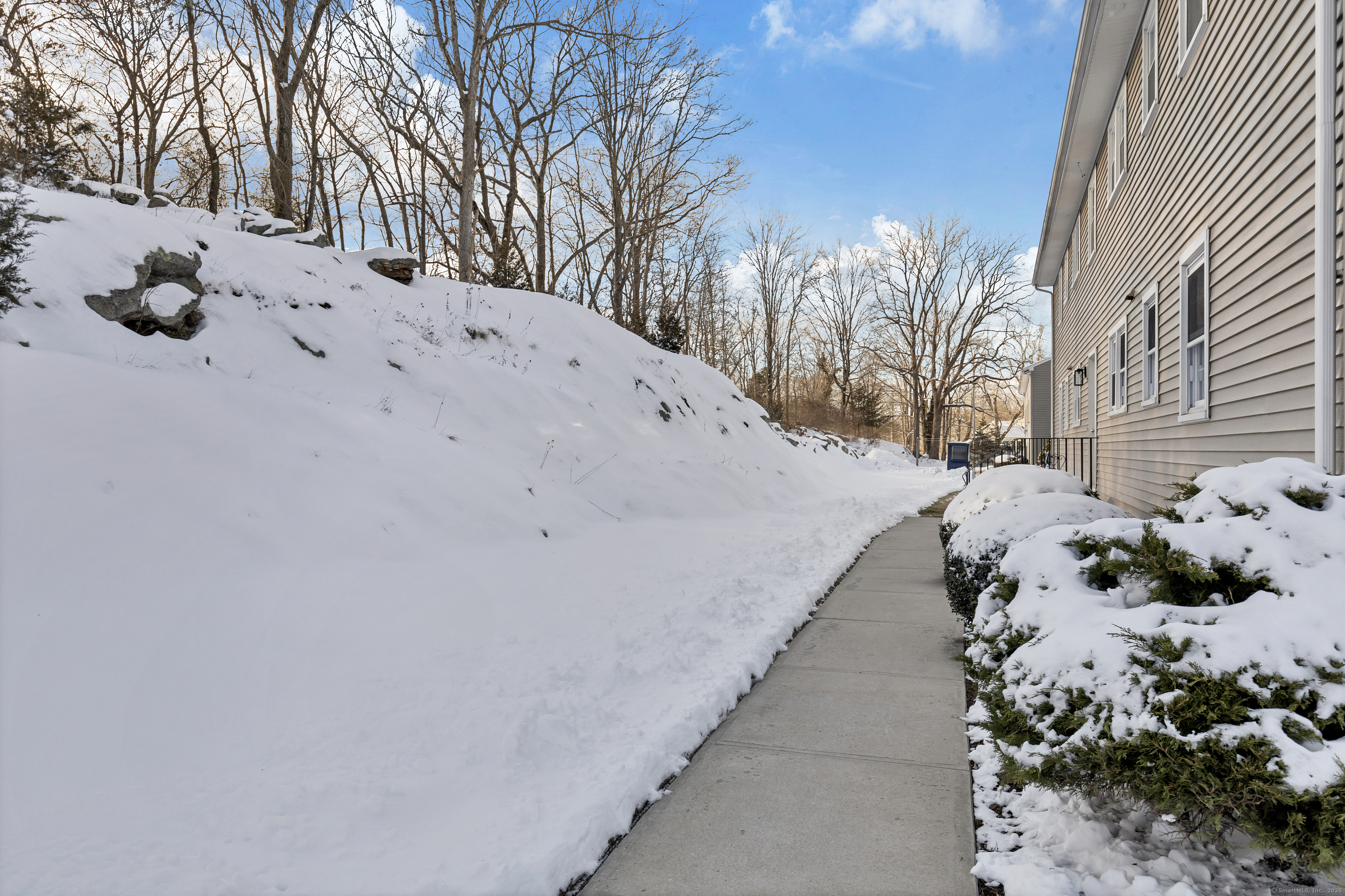 122 North Street, Unit 4 Guilford, CT 06437 - Photo 22 of 22 a view of a backyard of snow