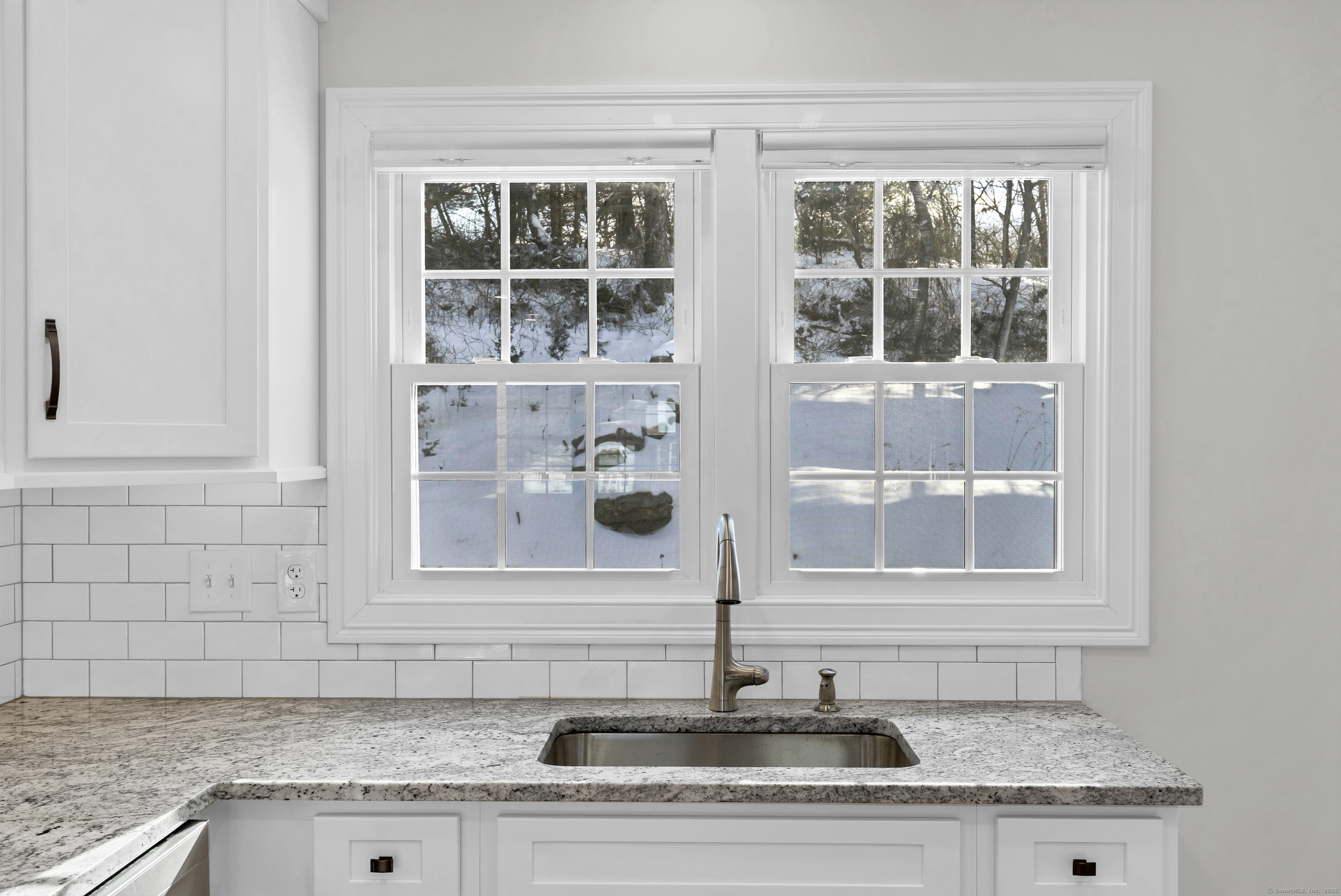 122 North Street, Unit 4 Guilford, CT 06437 - Photo 6 of 22 a bathroom with a granite countertop sink and window