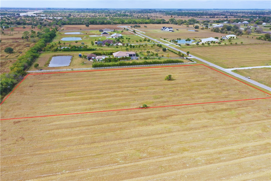 7225 6th Street Southwest Vero Beach, FL 32968 - Photo 1 of 4 an aerial view of a city