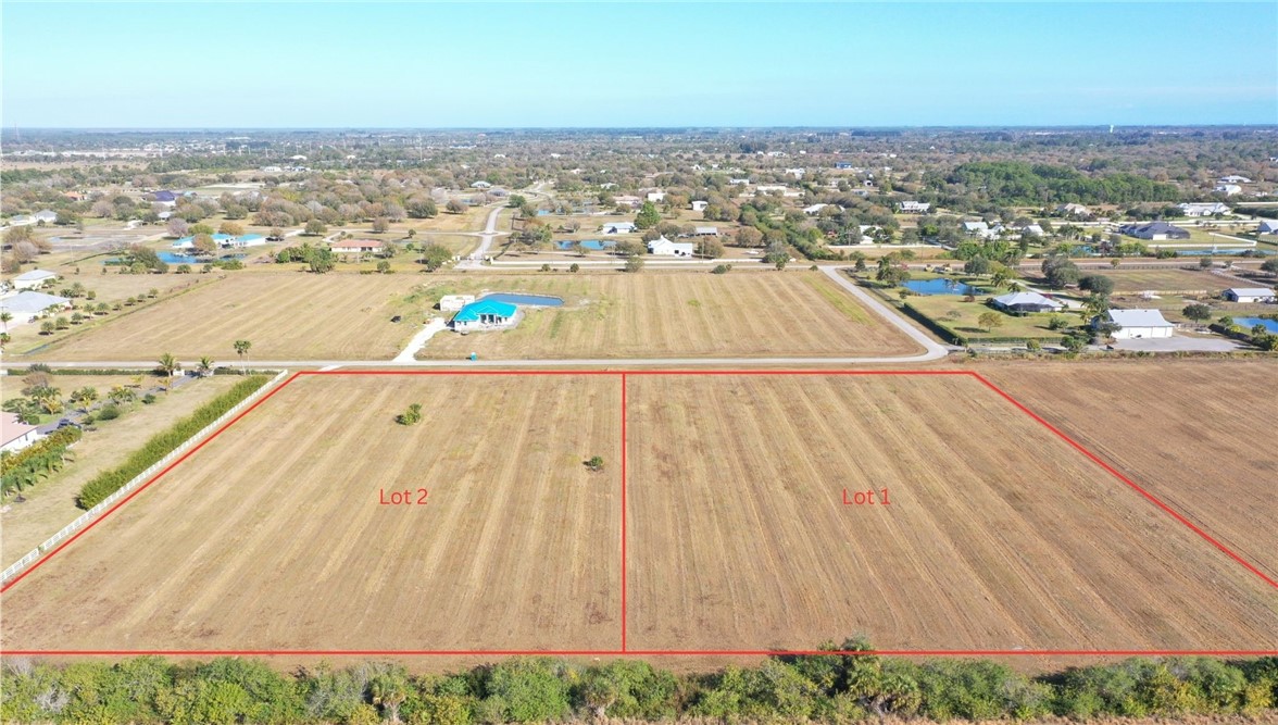 7225 6th Street Southwest Vero Beach, FL 32968 - Photo 4 of 4 an aerial view of residential houses with outdoor space