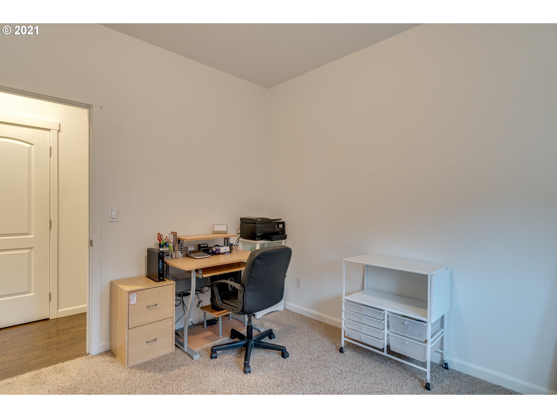 2609 South 18th Court Ridgefield, WA 98642 - Photo 13 of 26 a view of a workspace with furniture
