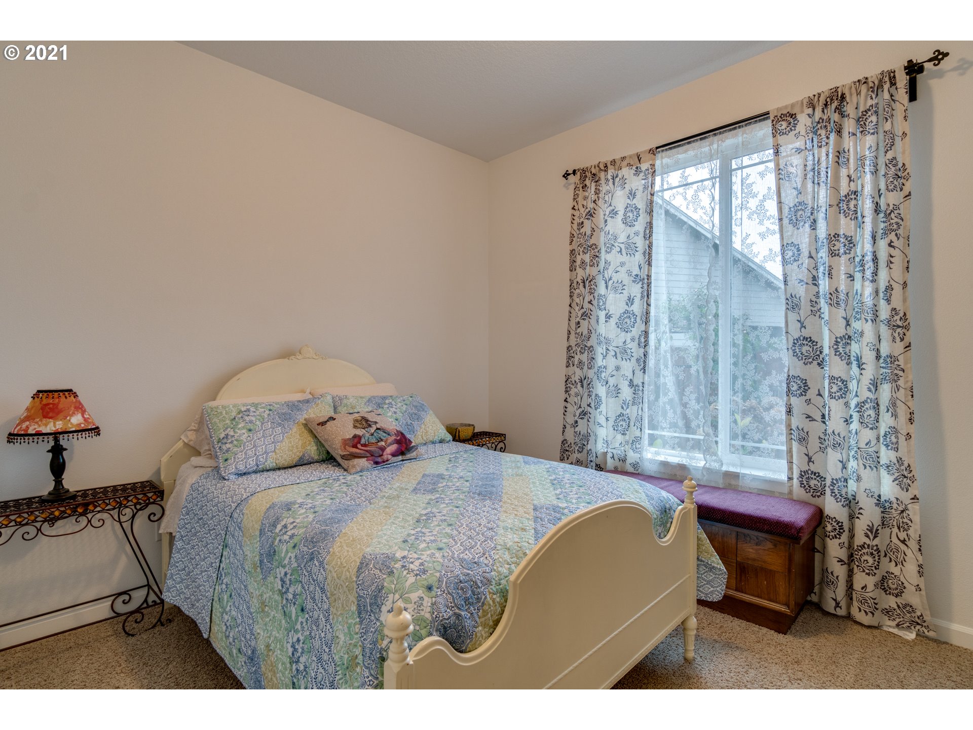 2609 South 18th Court Ridgefield, WA 98642 - Photo 15 of 26 a bedroom with a bed and a chair