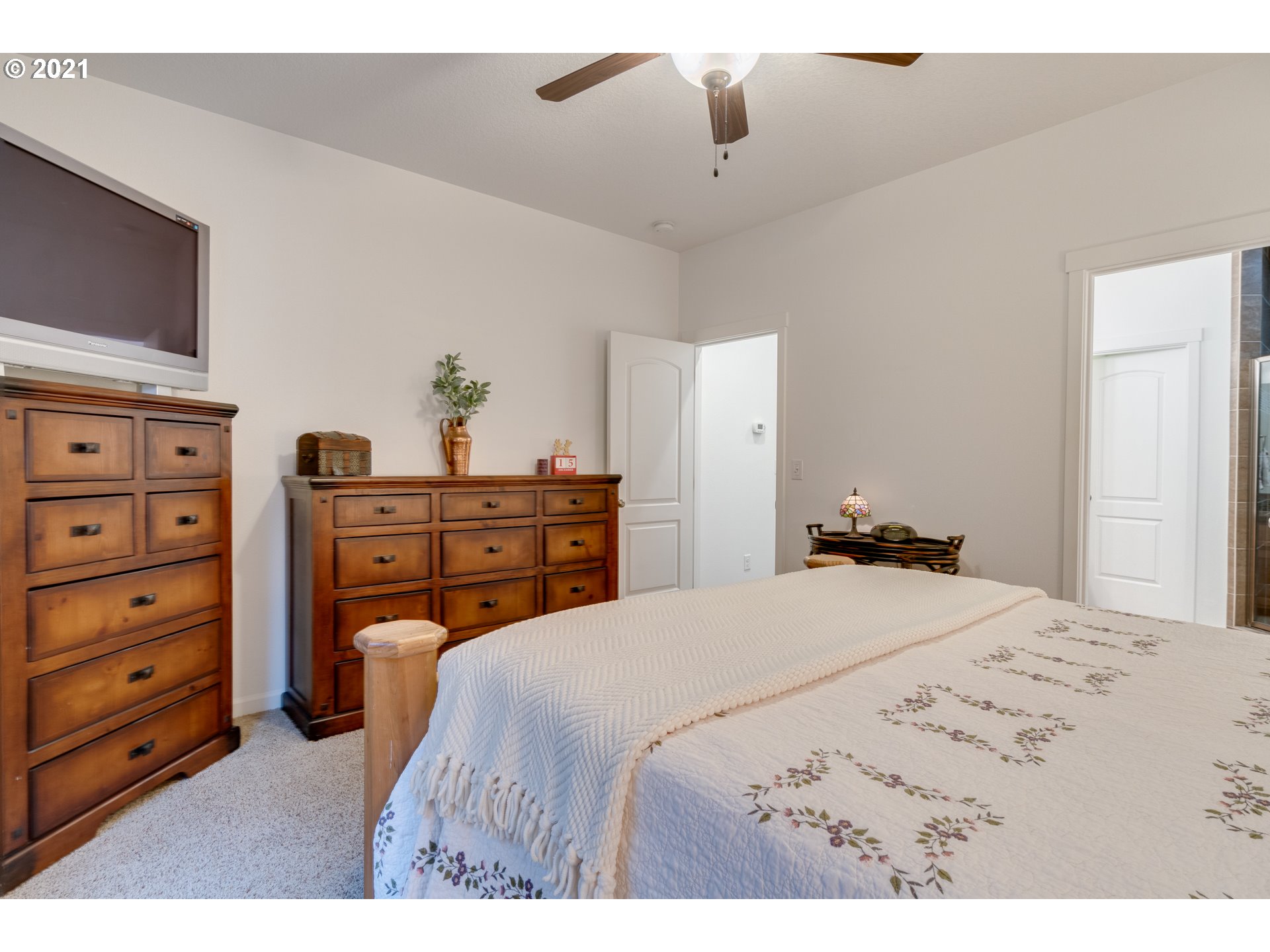 2609 South 18th Court Ridgefield, WA 98642 - Photo 18 of 26 a bedroom with a bed and a dresser