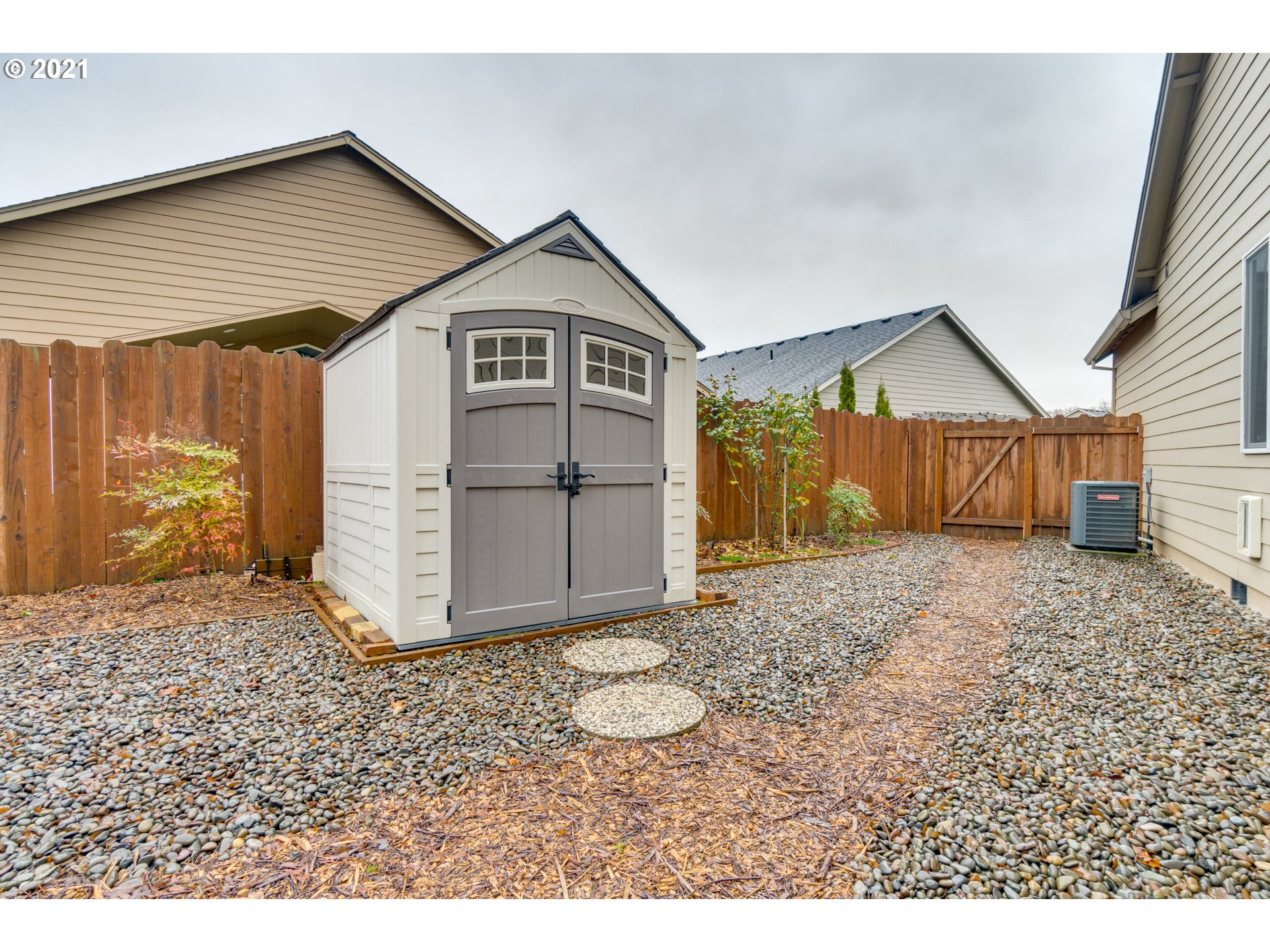 2609 South 18th Court Ridgefield, WA 98642 - Photo 24 of 26 a view of a house with a yard and garage