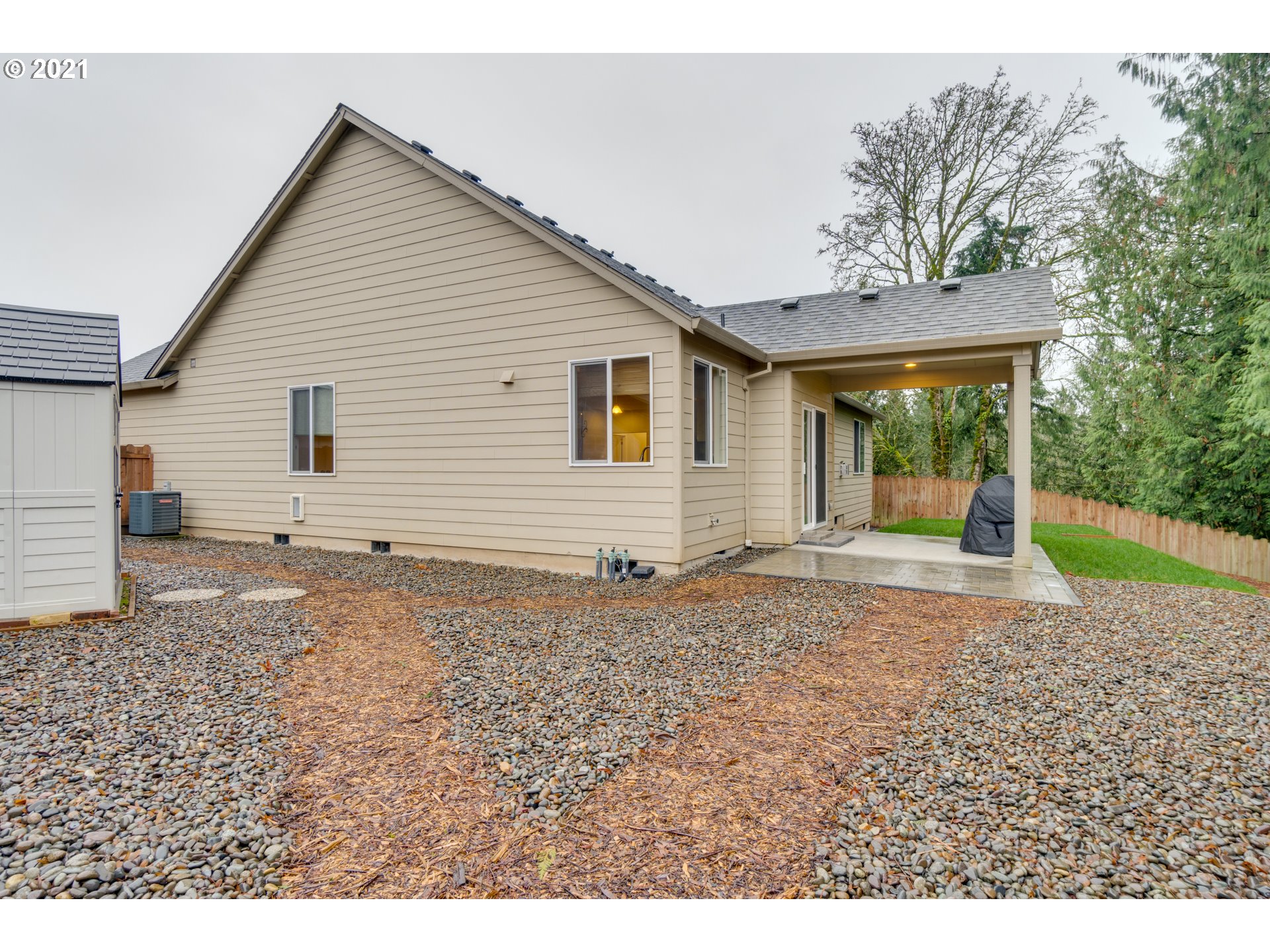 2609 South 18th Court Ridgefield, WA 98642 - Photo 25 of 26 a backyard of a house with lots of green space