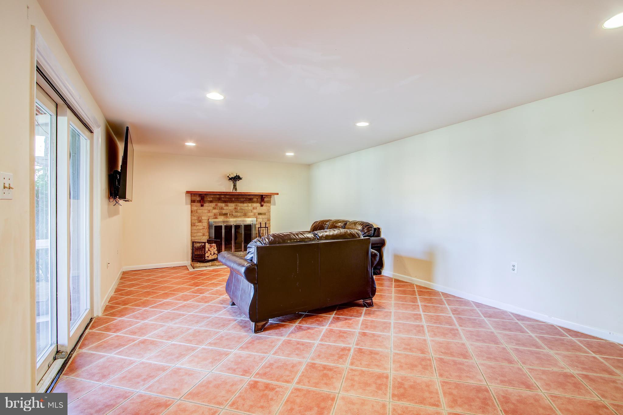 4805 Rim Rock Road Rockville, MD 20853 - Photo 23 of 31 Family Room Wood Burning Fireplace