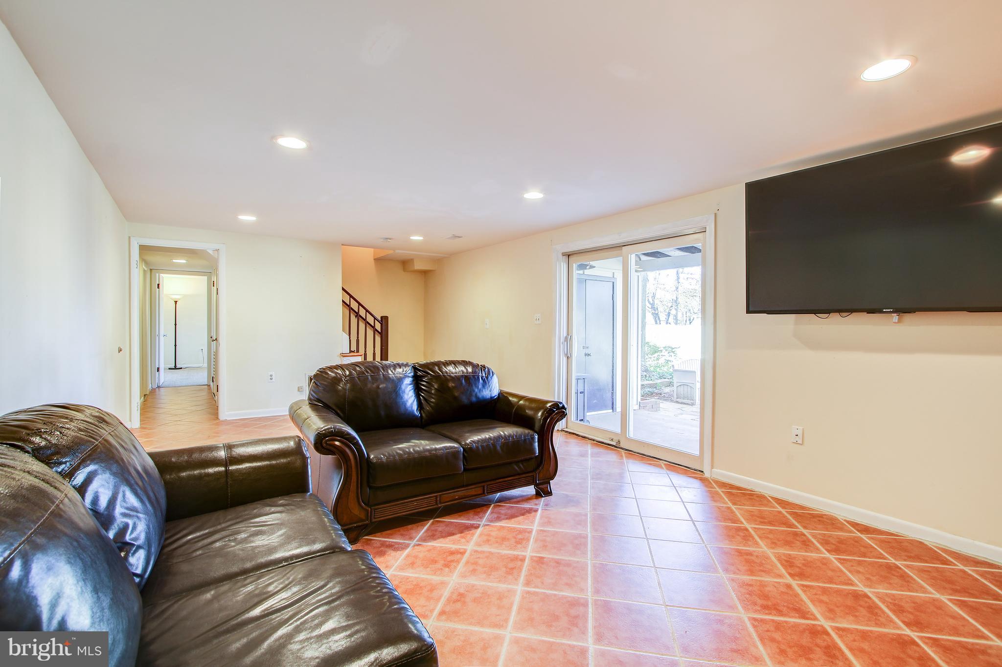 4805 Rim Rock Road Rockville, MD 20853 - Photo 24 of 31 Finished Basement With Level Walk Out Exit