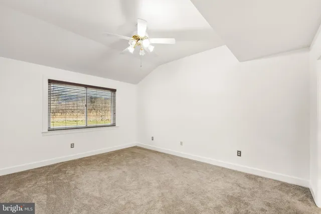 a view of a swimming pool with an outdoor space