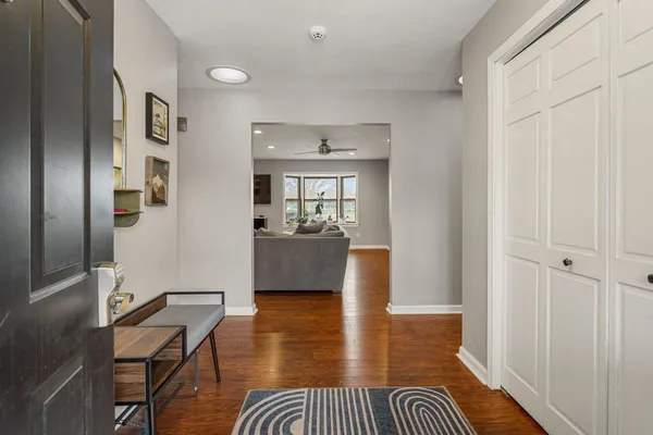 a view of a livingroom with furniture and wooden floor