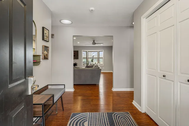 a view of a livingroom with furniture and wooden floor