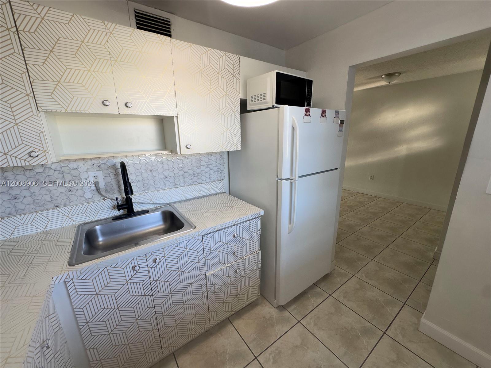 1725 West 60th Street, Unit F330 Hialeah, FL 33012 - Photo 7 of 12