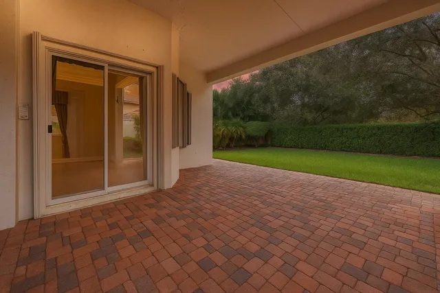 an empty room with yard and a fountain