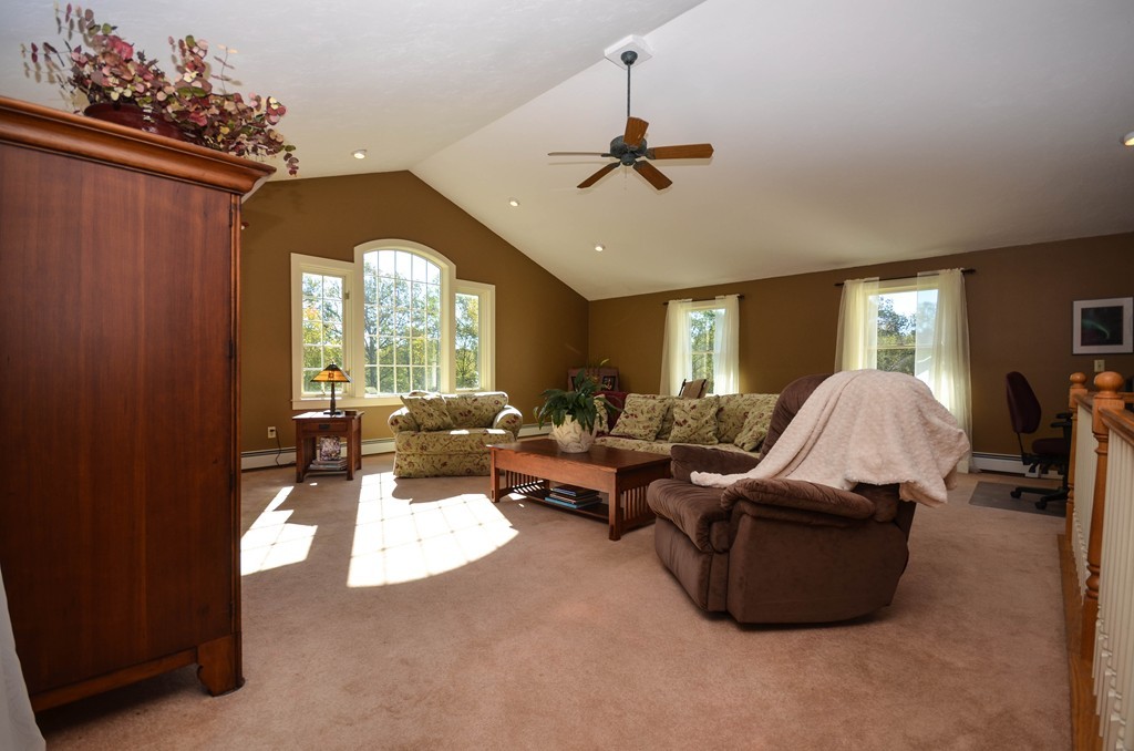 66 Barnett Road Sutton, MA 01590 - Photo 16 of 30 a living room with furniture and a large window