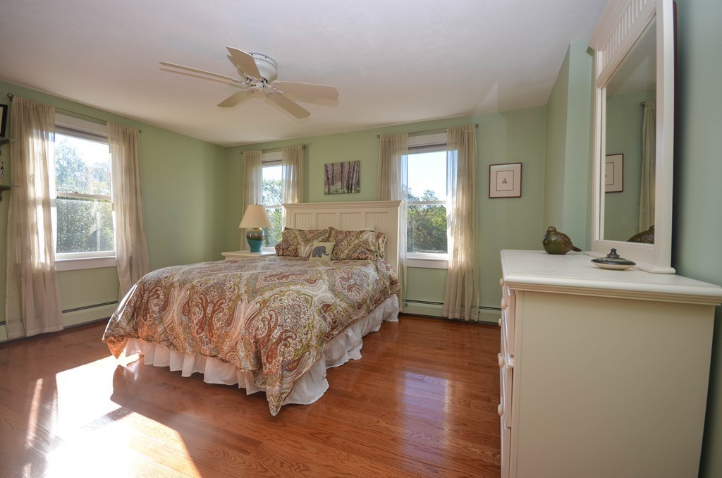 66 Barnett Road Sutton, MA 01590 - Photo 23 of 30 a bedroom with a bed and window