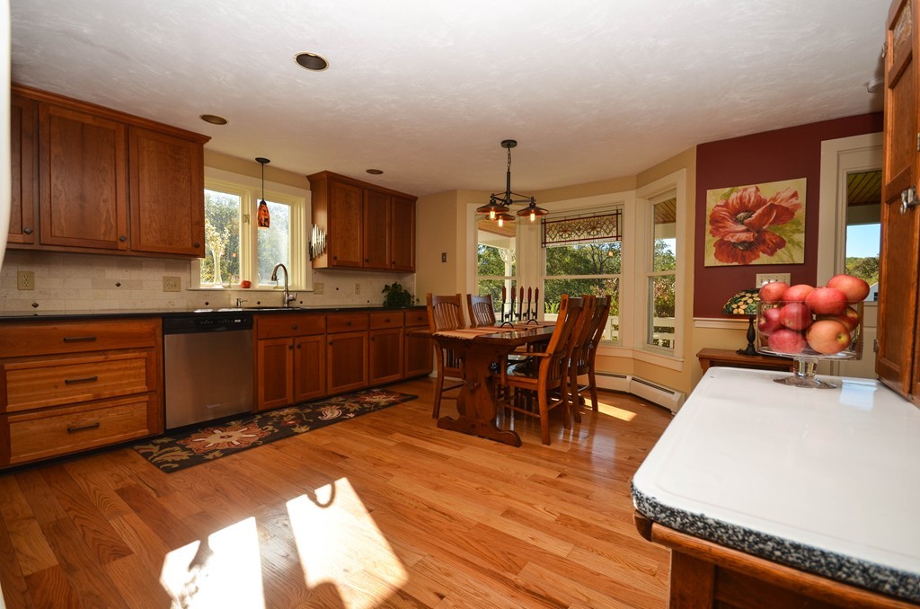 66 Barnett Road Sutton, MA 01590 - Photo 5 of 30 a very nice looking dining room with kitchen island furniture a window and kitchen view