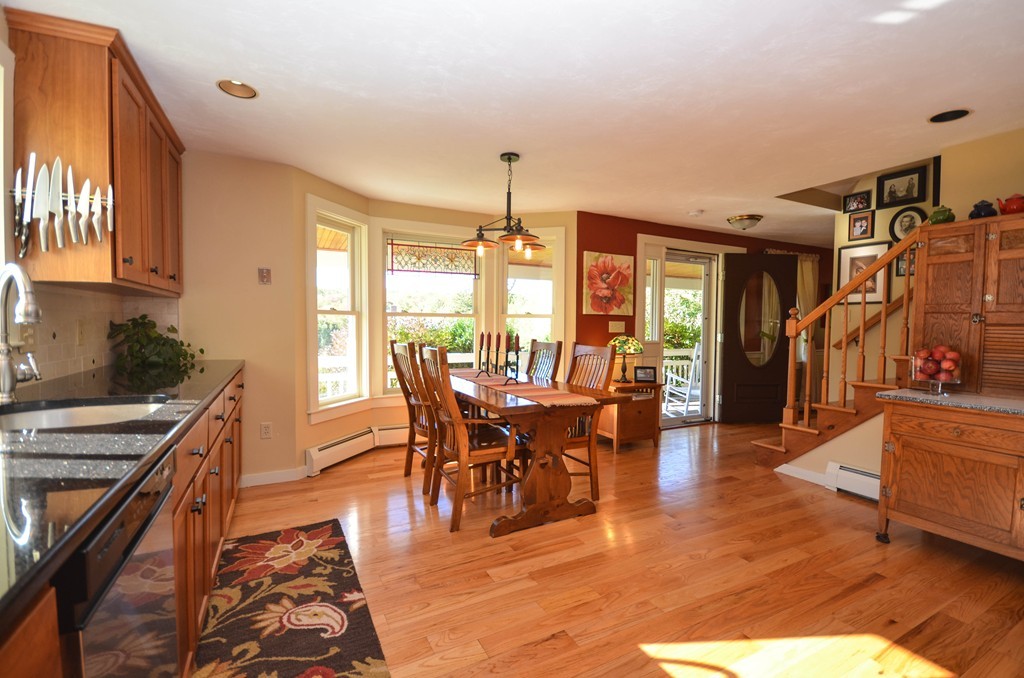 66 Barnett Road Sutton, MA 01590 - Photo 6 of 30 a view of a dining room with furniture window and wooden floor