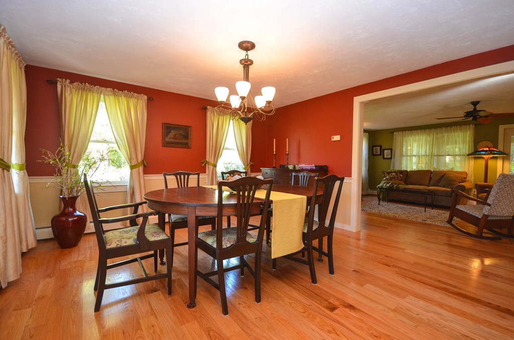 66 Barnett Road Sutton, MA 01590 - Photo 9 of 30 a view of a dining room with furniture window and wooden floor