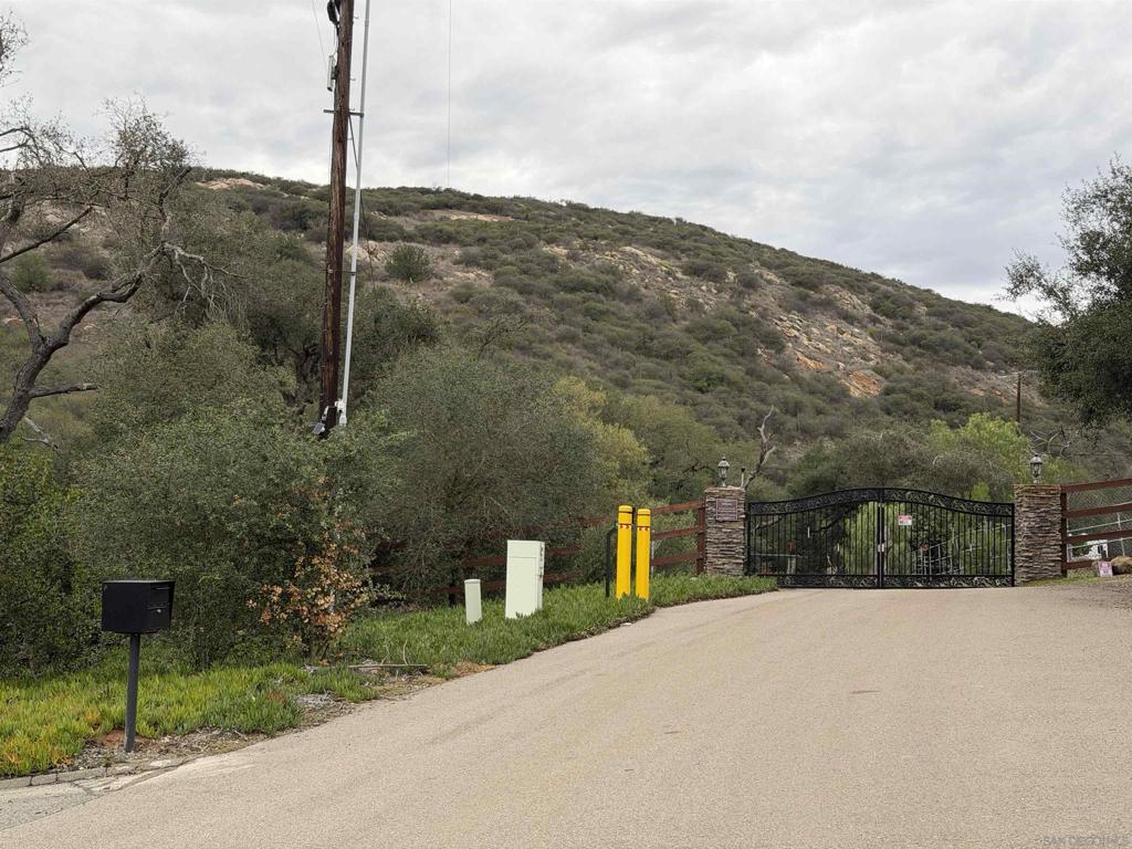 Mt Israel Road Escondido, CA 92029 - Photo 11 of 18 a view of a road with a building in the background