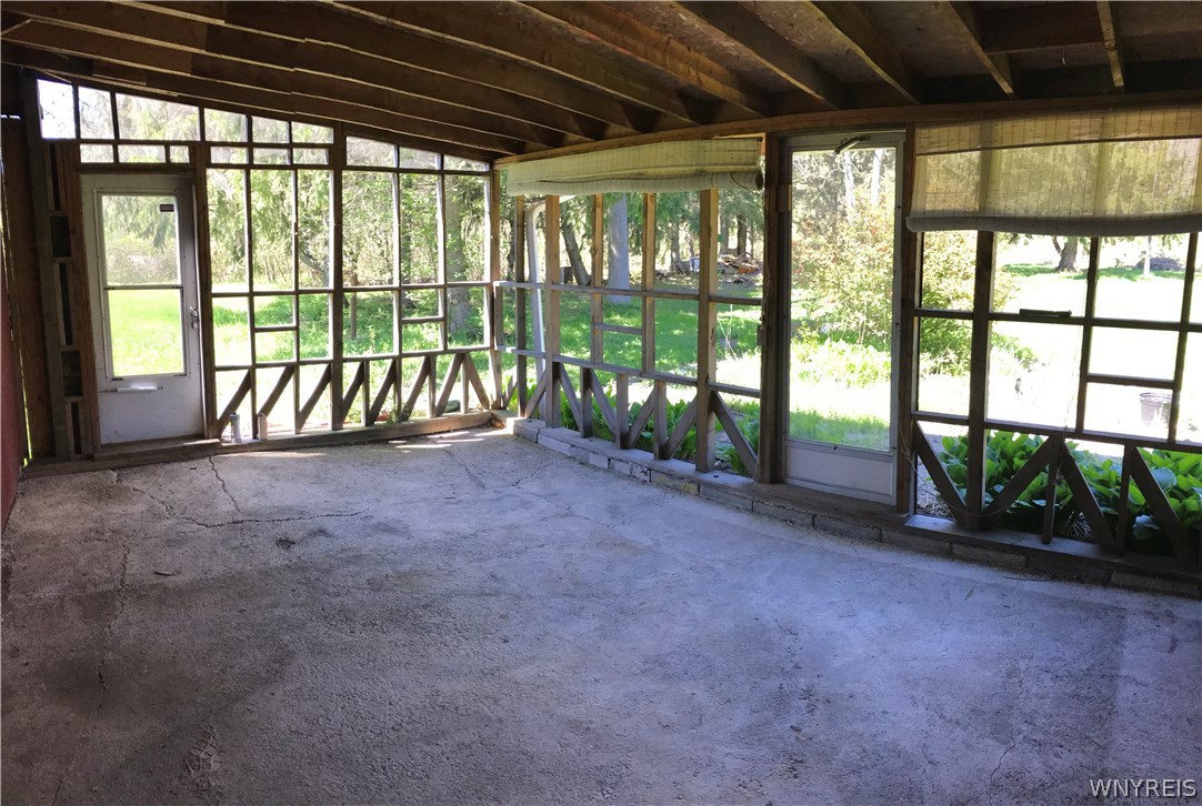1187 Cain Road Evans, NY 14006 - Photo 14 of 21 Back screened-in Patio