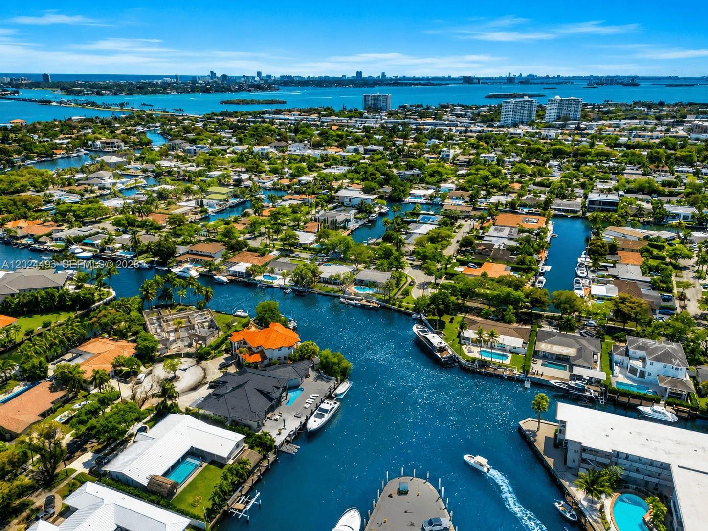 1995 Ixora Road North Miami, FL 33181 - Photo 1 of 23 an aerial view of residential houses with outdoor space