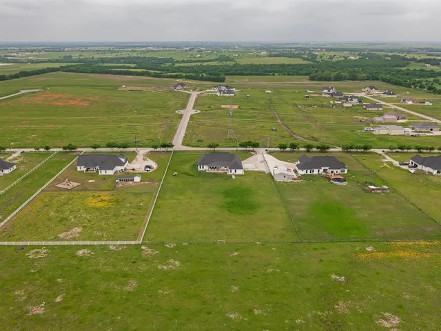 a view of an outdoor space and tennis court