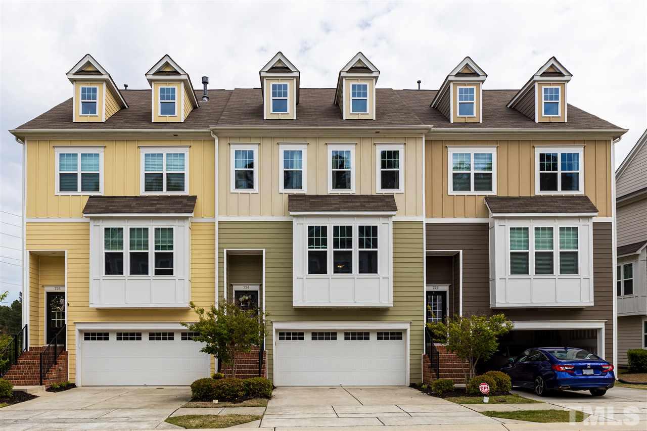 724 Edgewater Ridge Court Apex, NC 27523 - Photo 1 of 30 a front view of residential houses with stairs