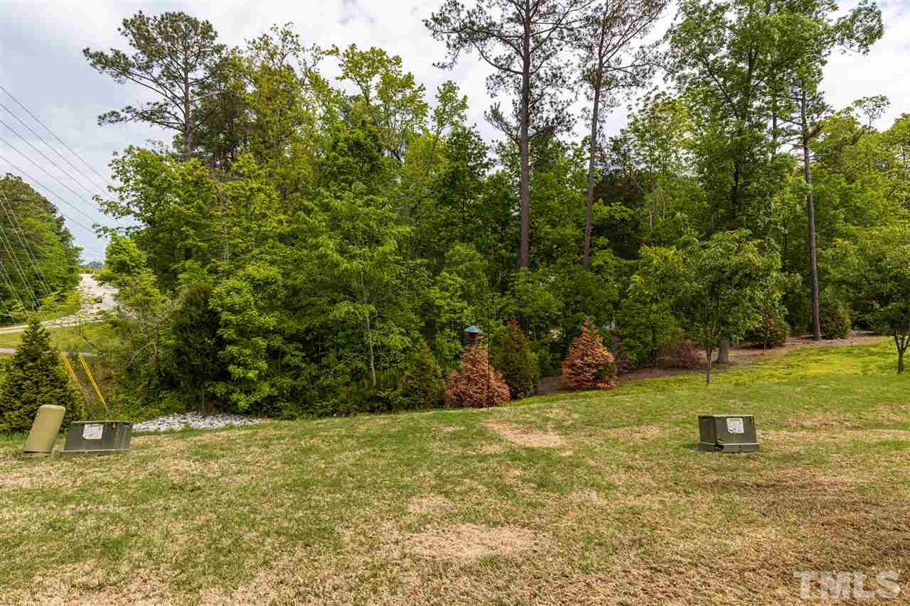 724 Edgewater Ridge Court Apex, NC 27523 - Photo 27 of 30 a view of a yard