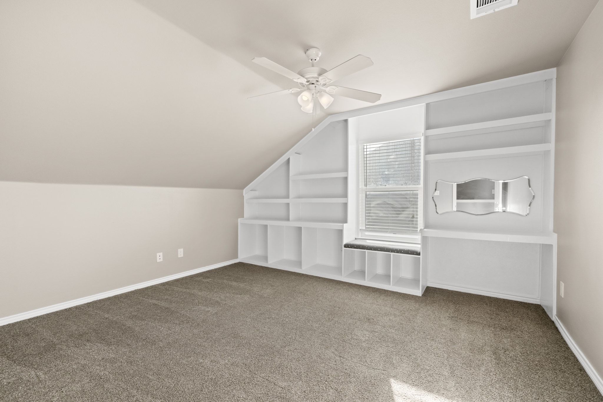 609 A West 7th Street Taylor, TX 76574 - Photo 17 of 35 a view of an empty room with a window